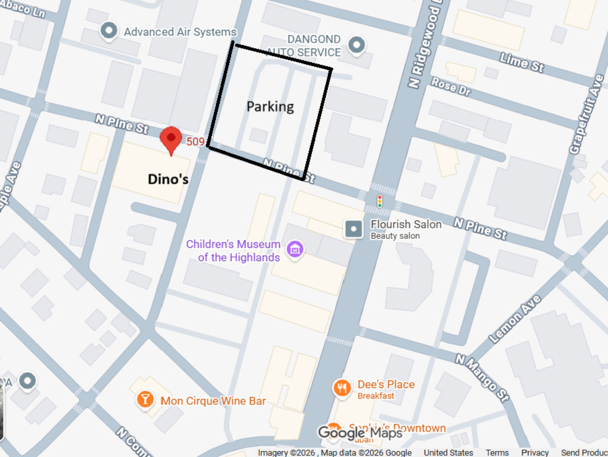 Map of a city street with a parking area marked and Dino's restaurant indicated.